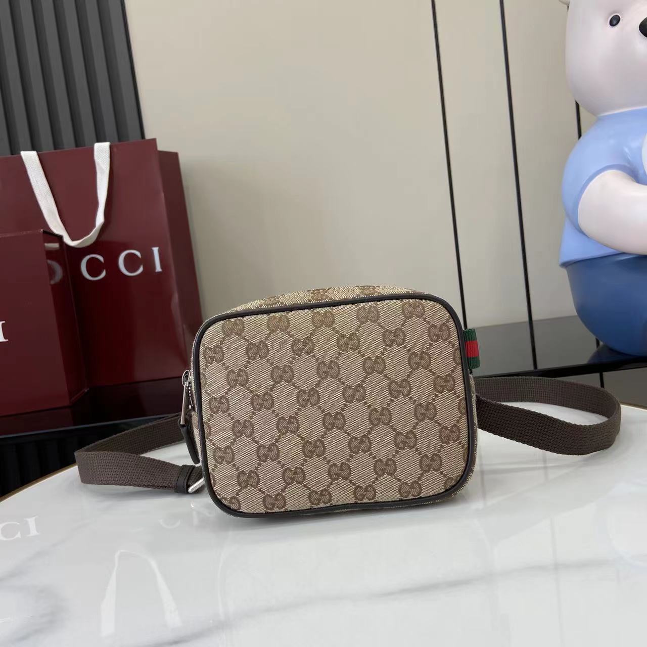 Gucci GG Canvas Mini Bag - FashionPlug
