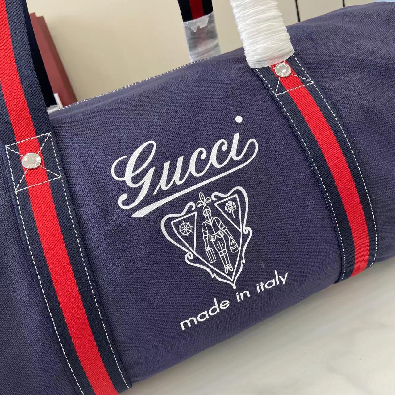 Gucci Large Printed Canvas Duffle Bag - FashionPlug