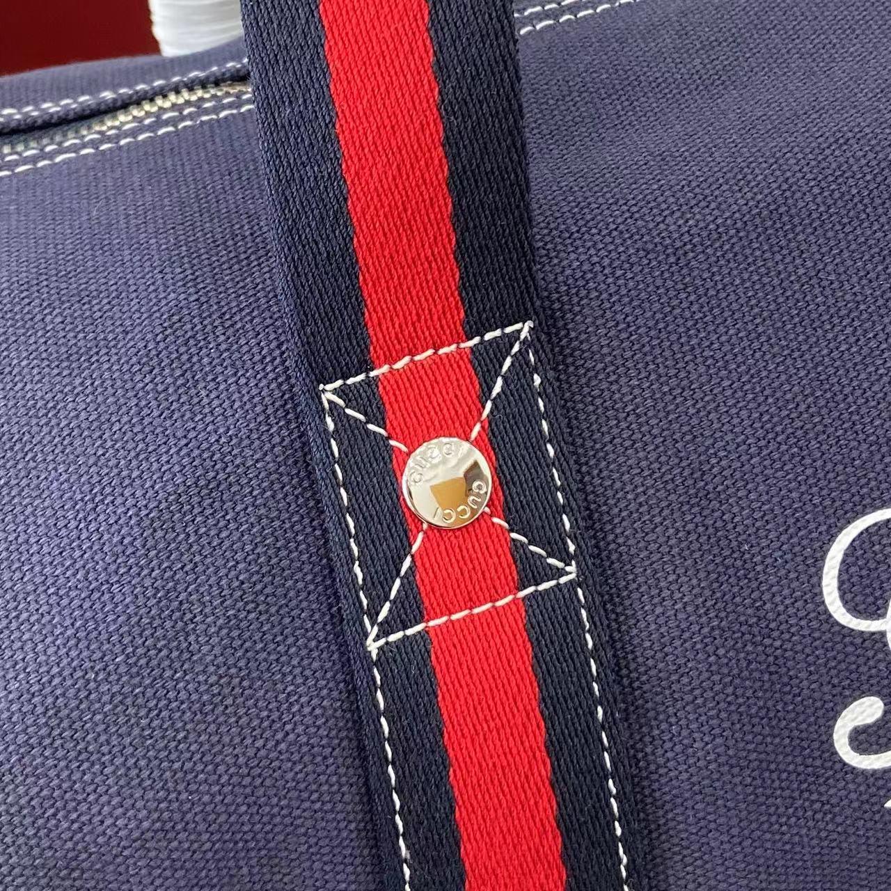 Gucci Large Printed Canvas Duffle Bag - FashionPlug