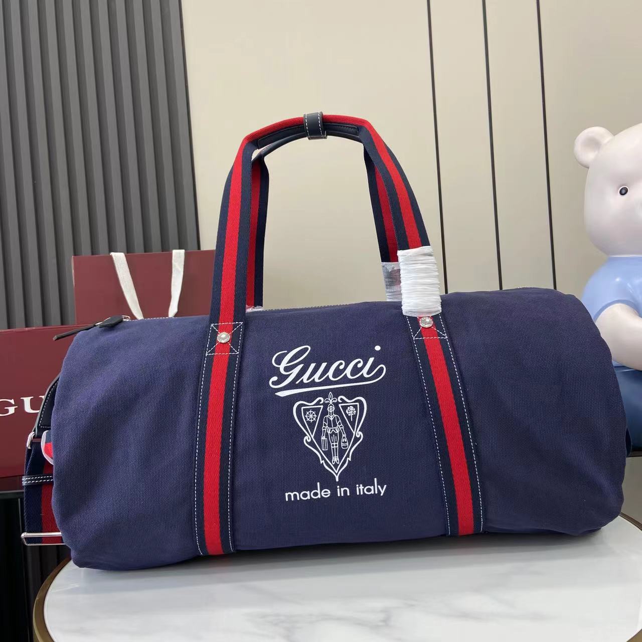Gucci Large Printed Canvas Duffle Bag - FashionPlug