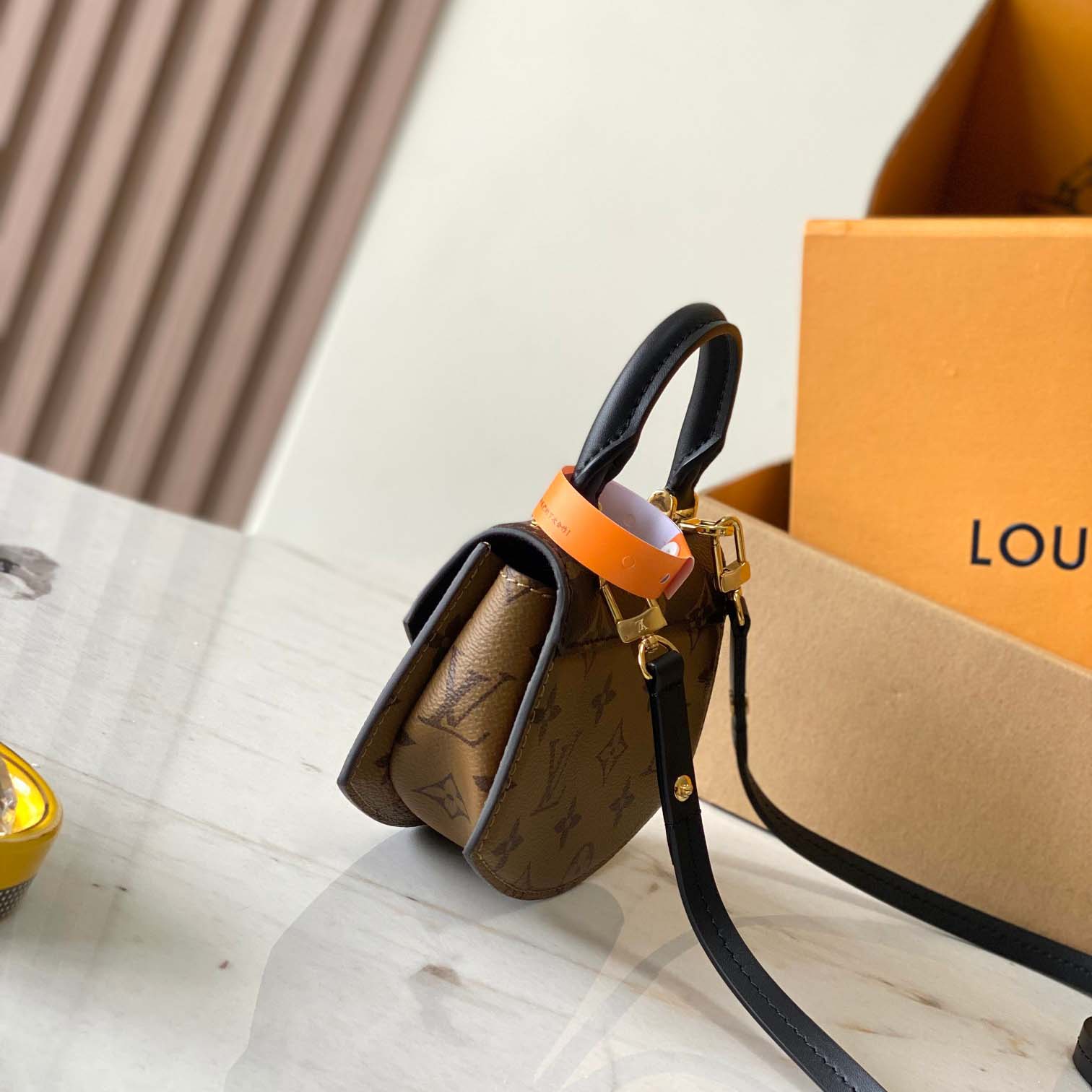 Louis Vuitton Tilsitt Handbag   M83473 - FashionPlug