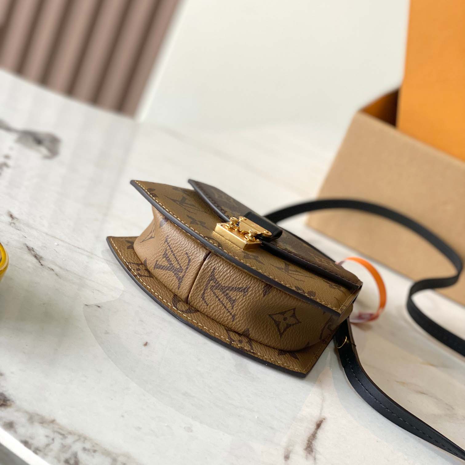 Louis Vuitton Tilsitt Handbag   M83473 - FashionPlug