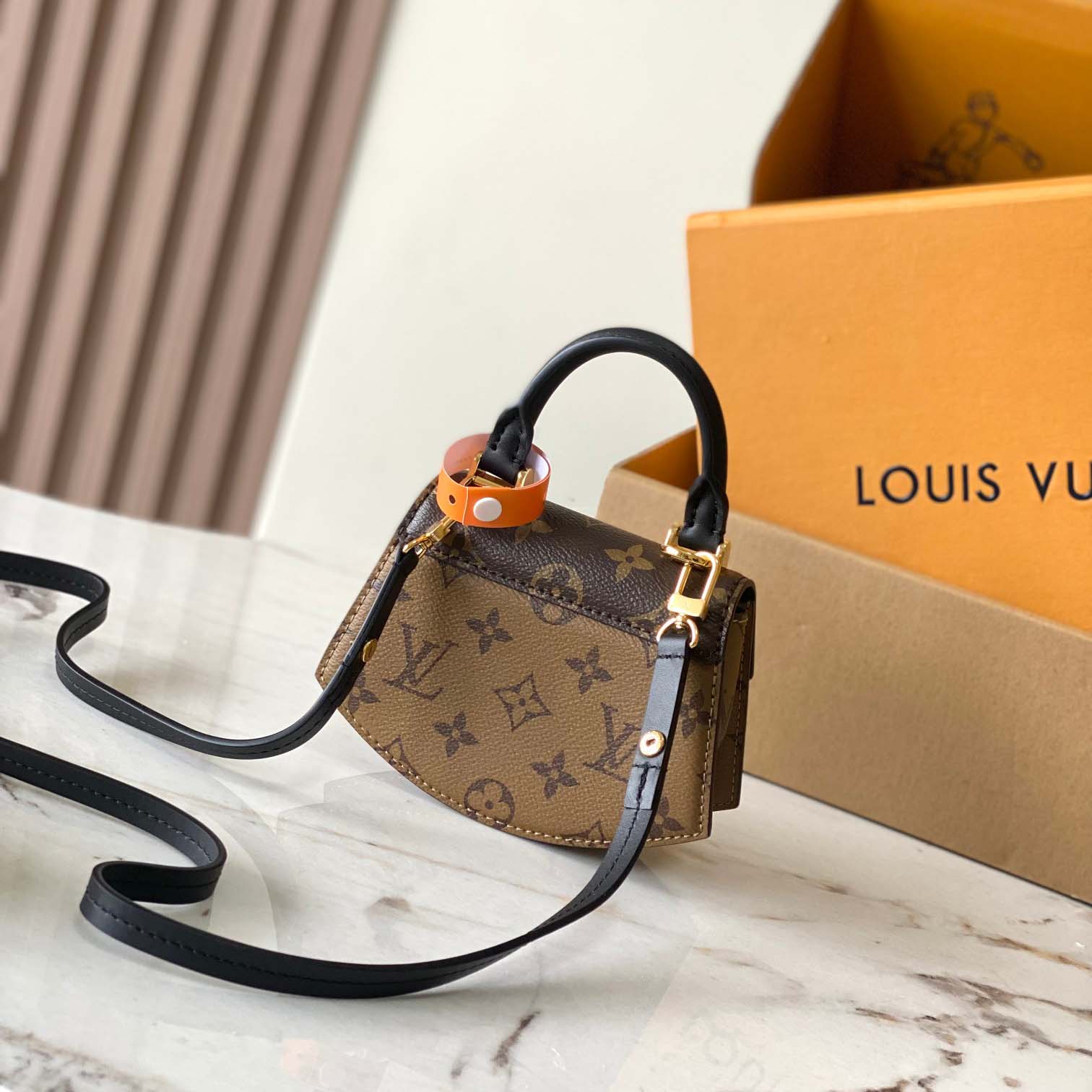 Louis Vuitton Tilsitt Handbag   M83473 - FashionPlug