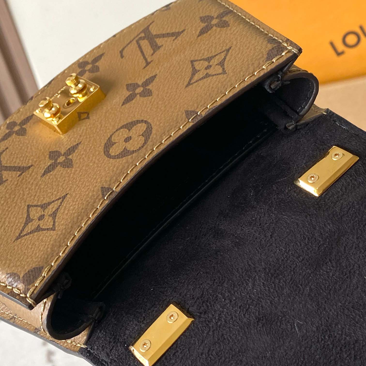 Louis Vuitton Tilsitt Handbag   M83473 - FashionPlug