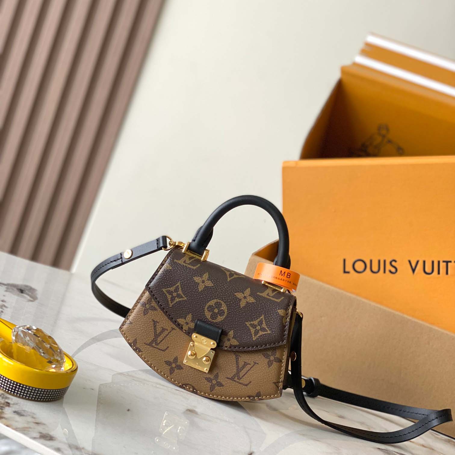 Louis Vuitton Tilsitt Handbag   M83473 - FashionPlug
