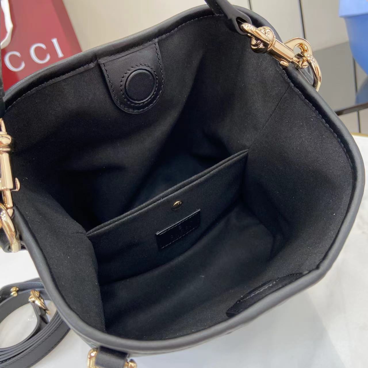 Gucci GG Emblem Small Bucket Bag  - FashionPlug