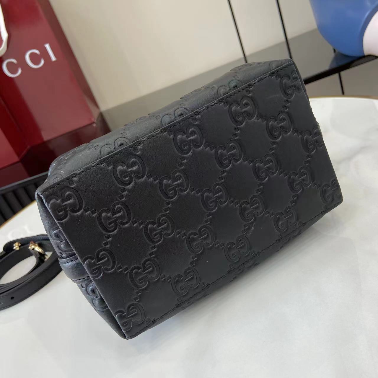 Gucci GG Emblem Small Bucket Bag  - FashionPlug