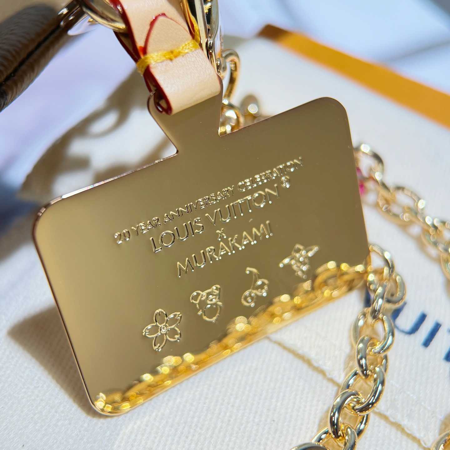 Louis Vuitton LV x TM Phone Holder  M14099 - FashionPlug