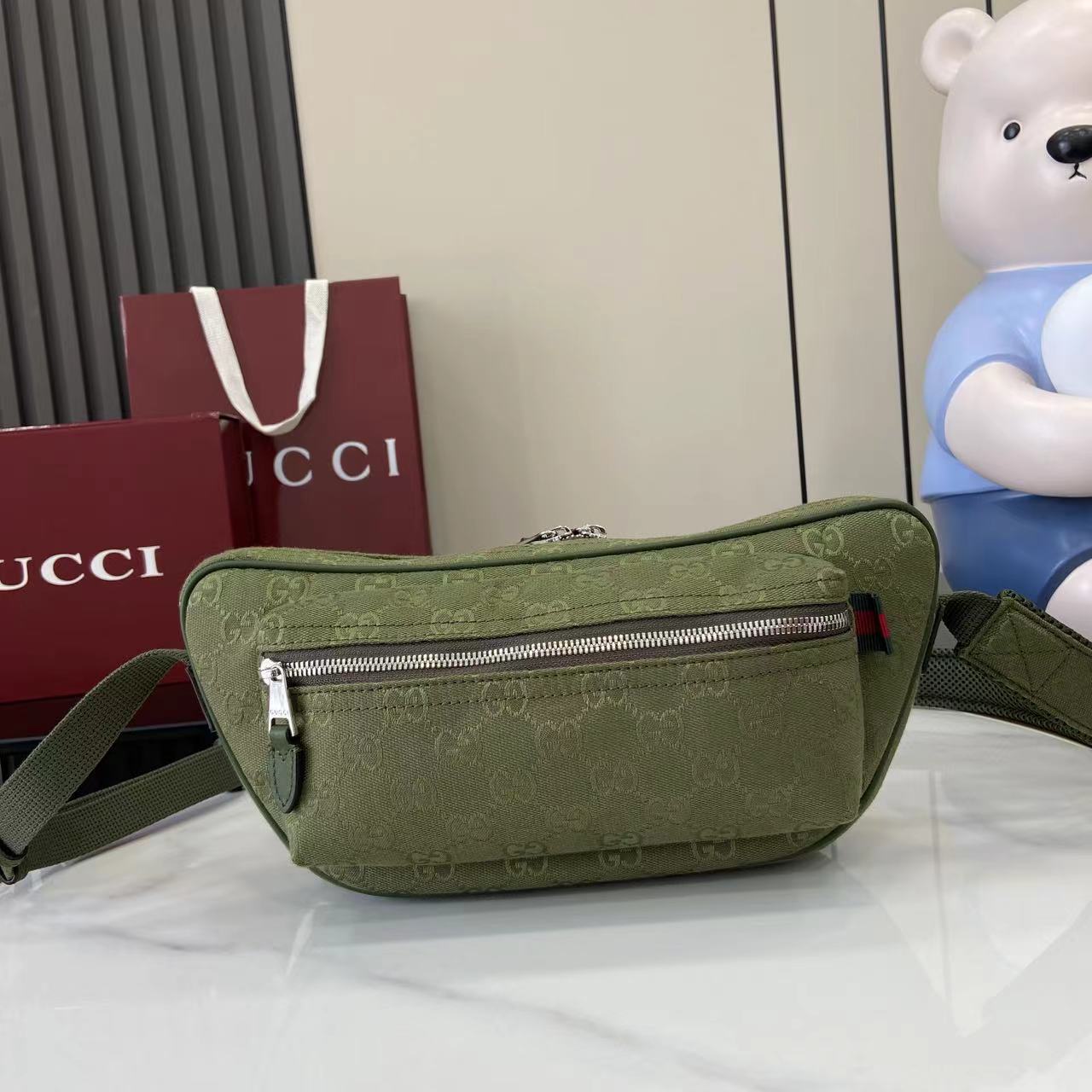 Gucci GG Canvas Large Slingbag - FashionPlug