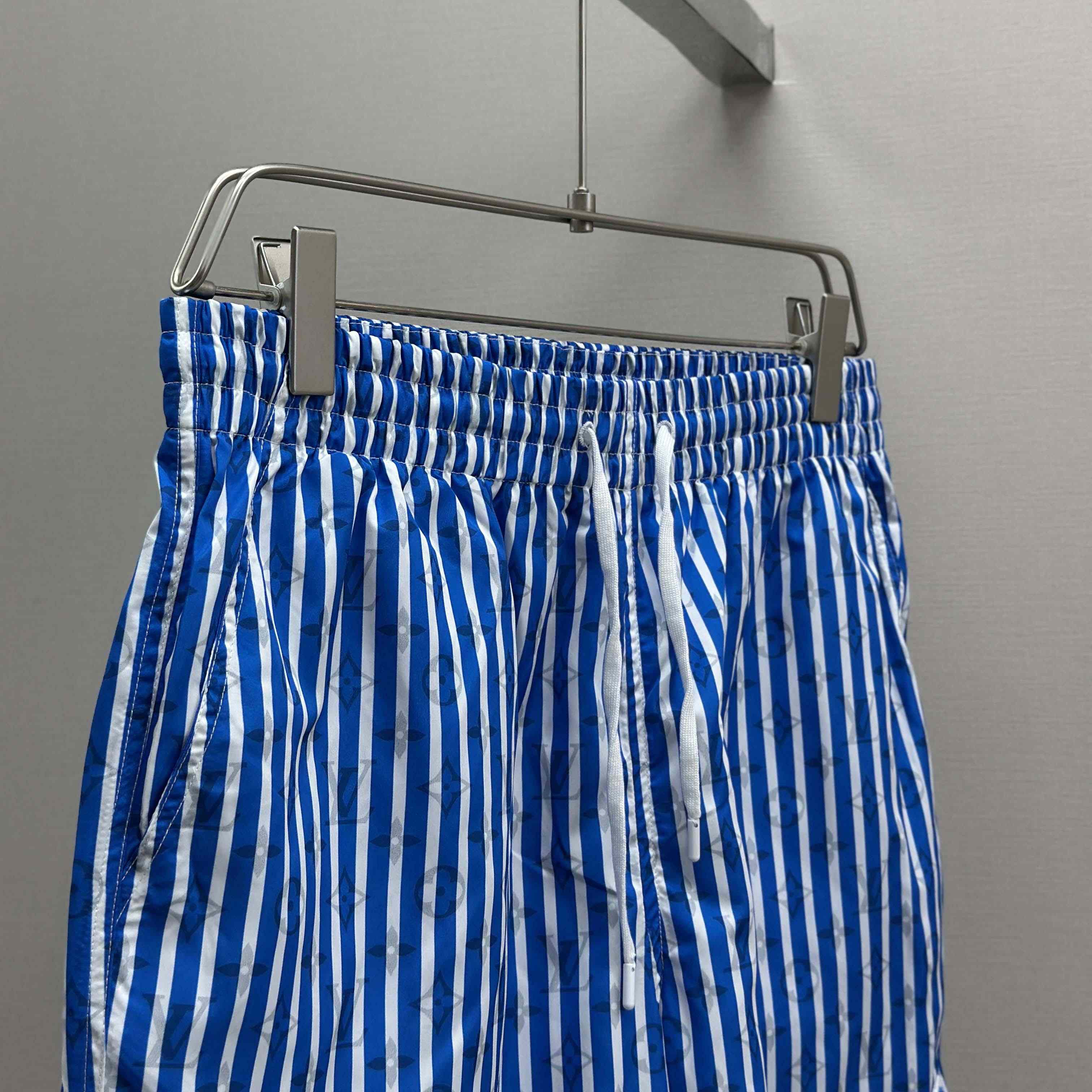 Louis Vuitton Monogram Striped Swim Shorts   1AHVZF - FashionPlug