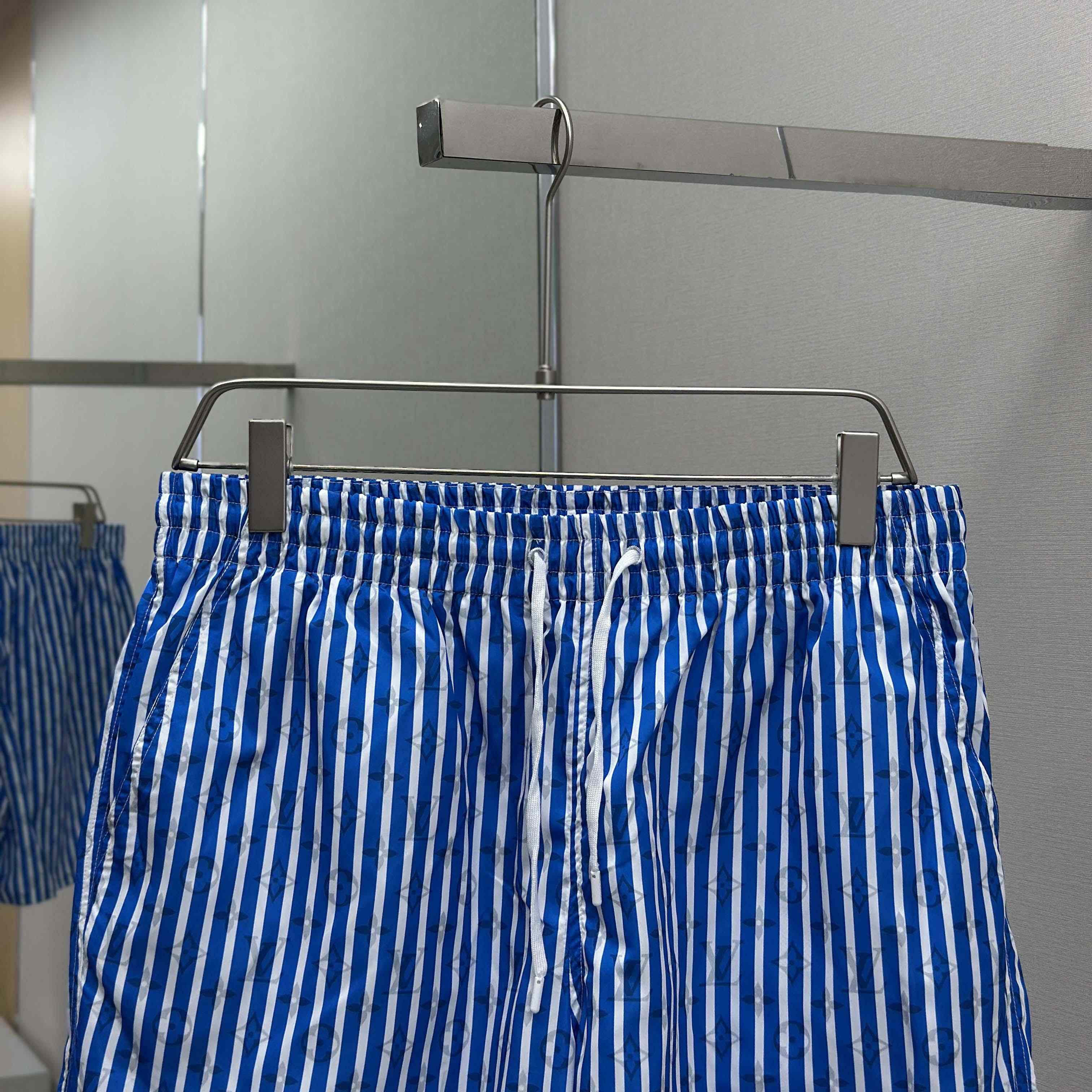 Louis Vuitton Monogram Striped Swim Shorts   1AHVZF - FashionPlug