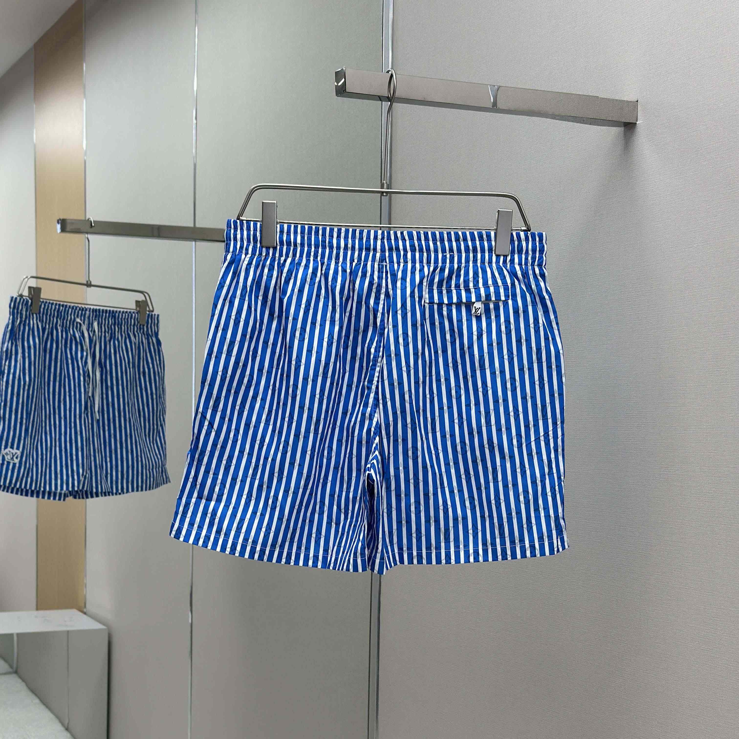 Louis Vuitton Monogram Striped Swim Shorts   1AHVZF - FashionPlug