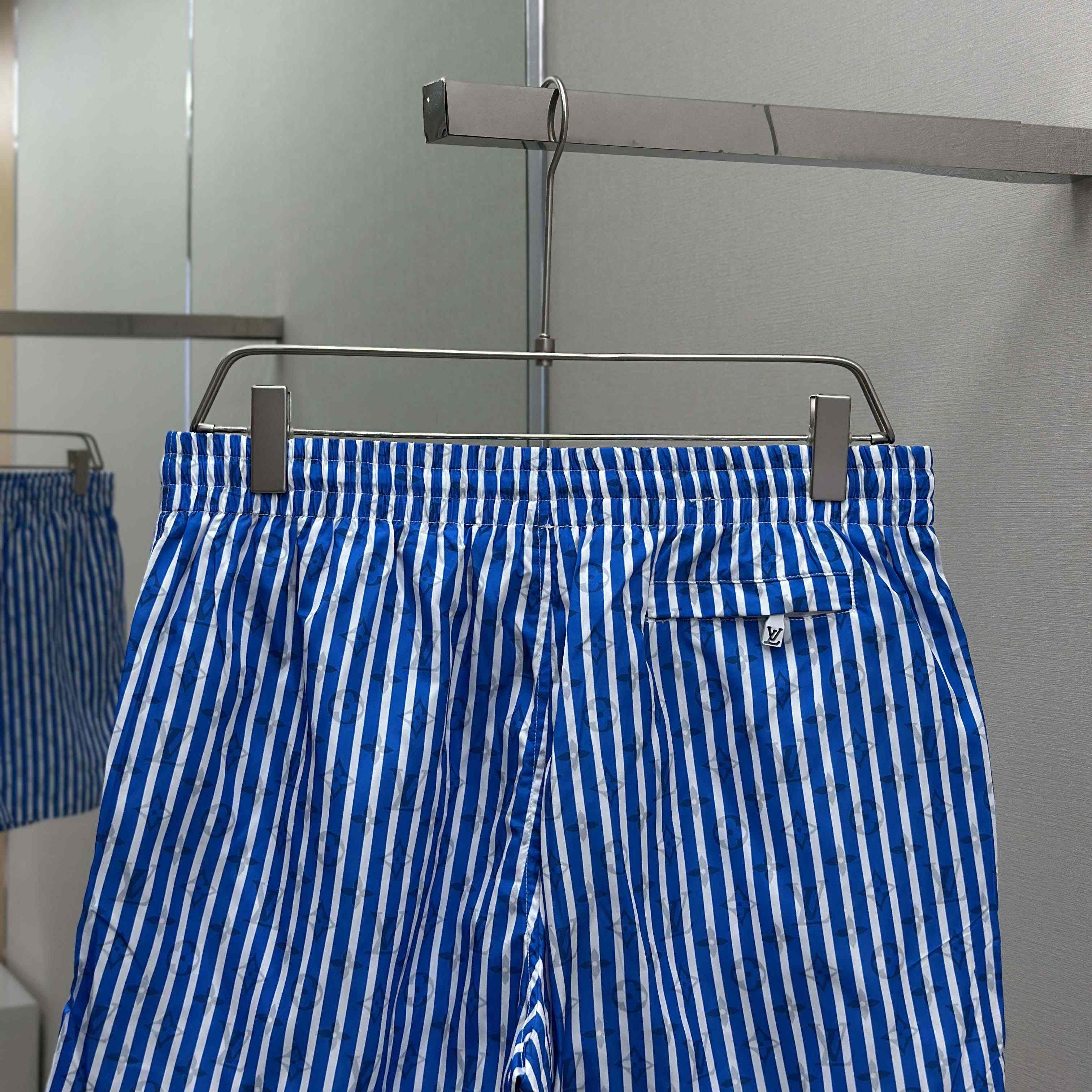 Louis Vuitton Monogram Striped Swim Shorts   1AHVZF - FashionPlug