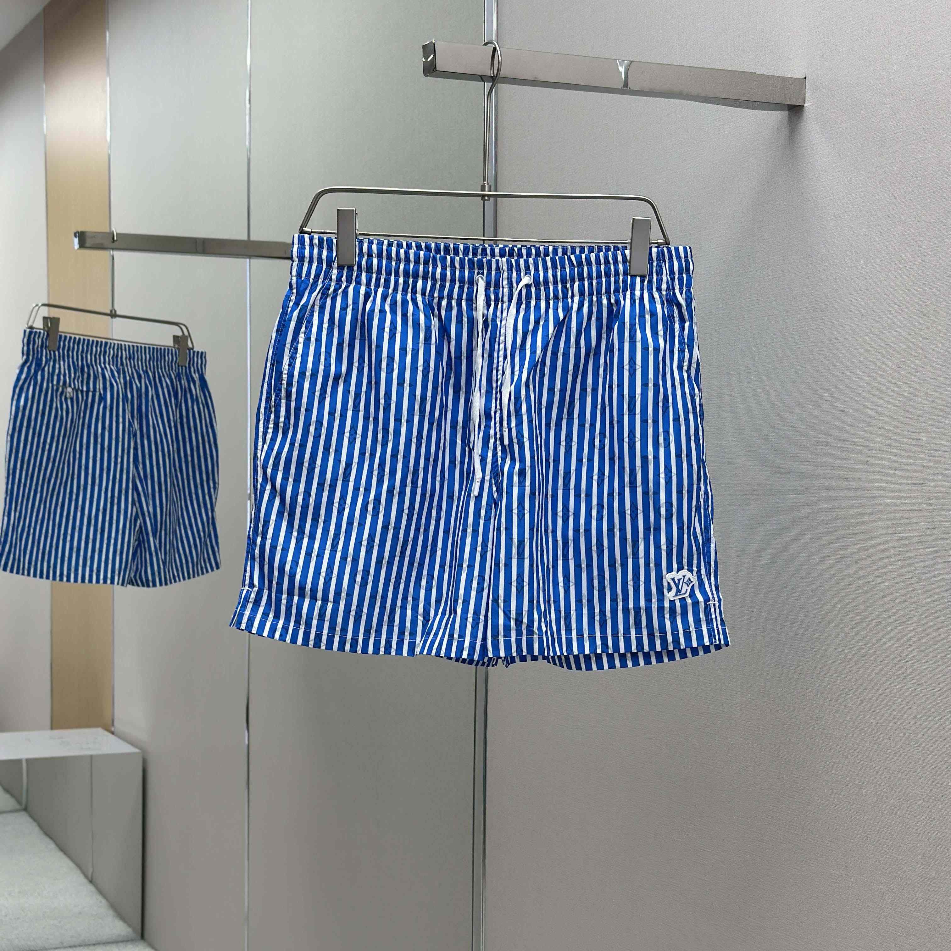 Louis Vuitton Monogram Striped Swim Shorts   1AHVZF - FashionPlug