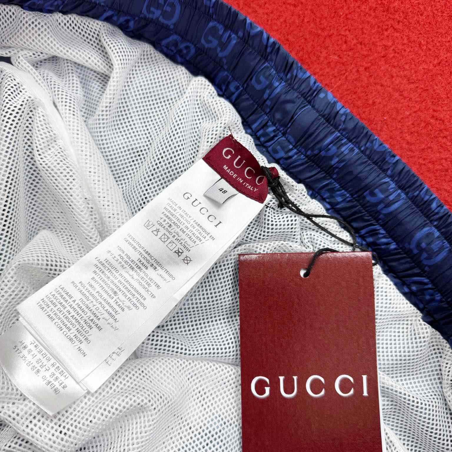 Gucci Printed Poplin Tech Swim Shorts - FashionPlug
