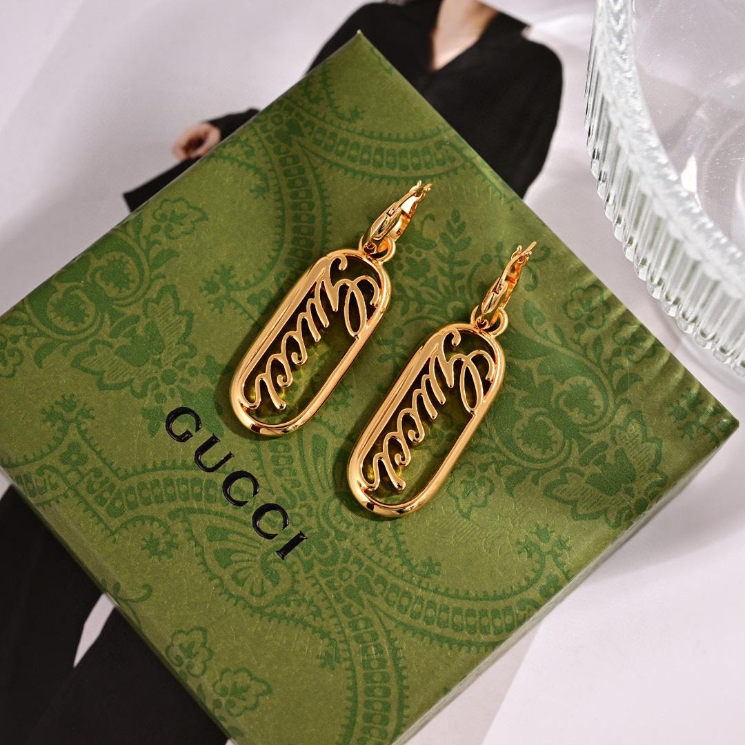 Gucci Script Logo Drop Earrings - FashionPlug