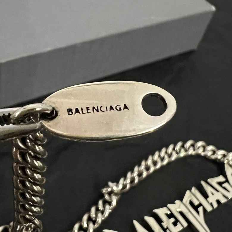 Balenciaga Typo Metal Necklace In Antique Silver Brass - FashionPlug
