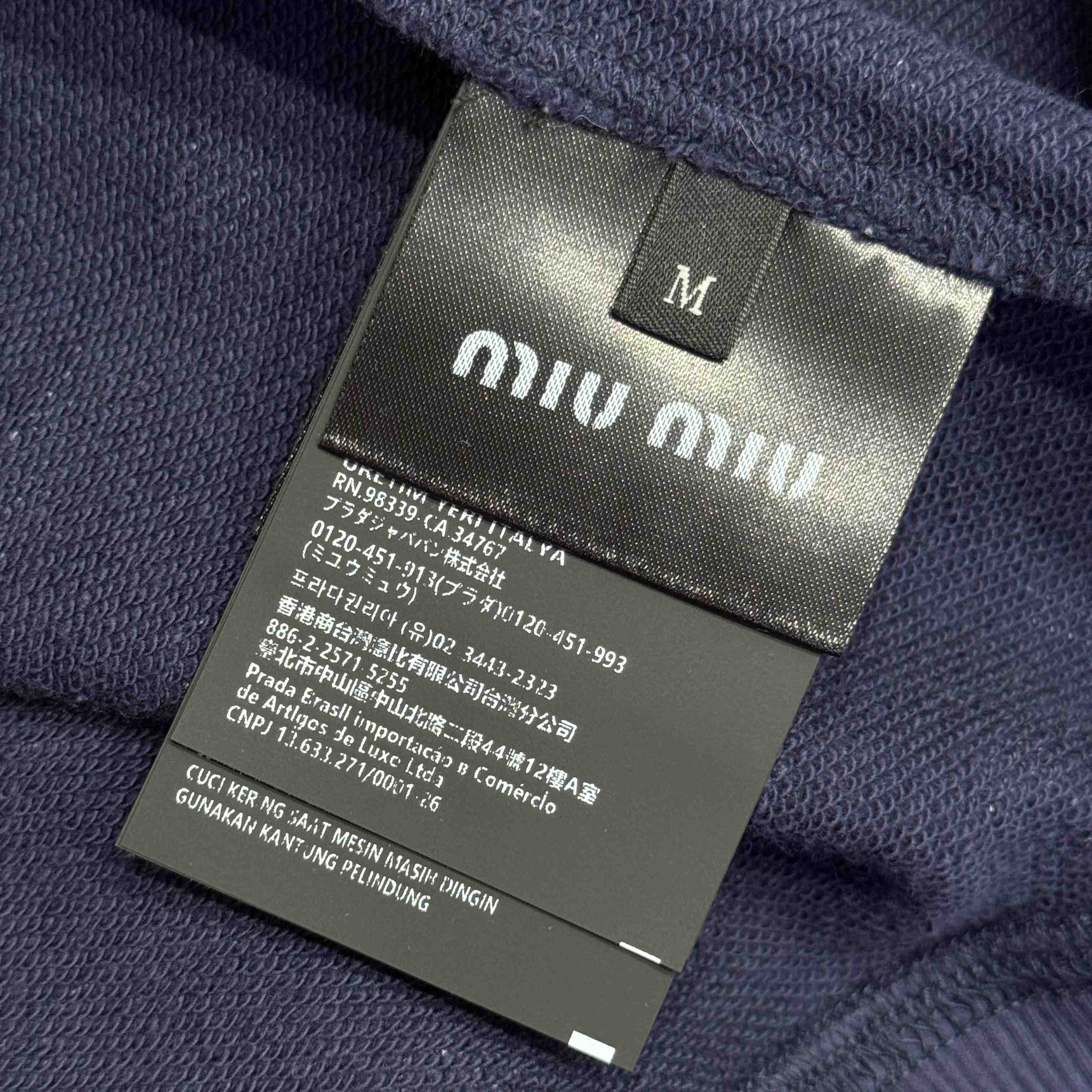 Miu Miu Striped ZIp-Up Polo Shirt - FashionPlug