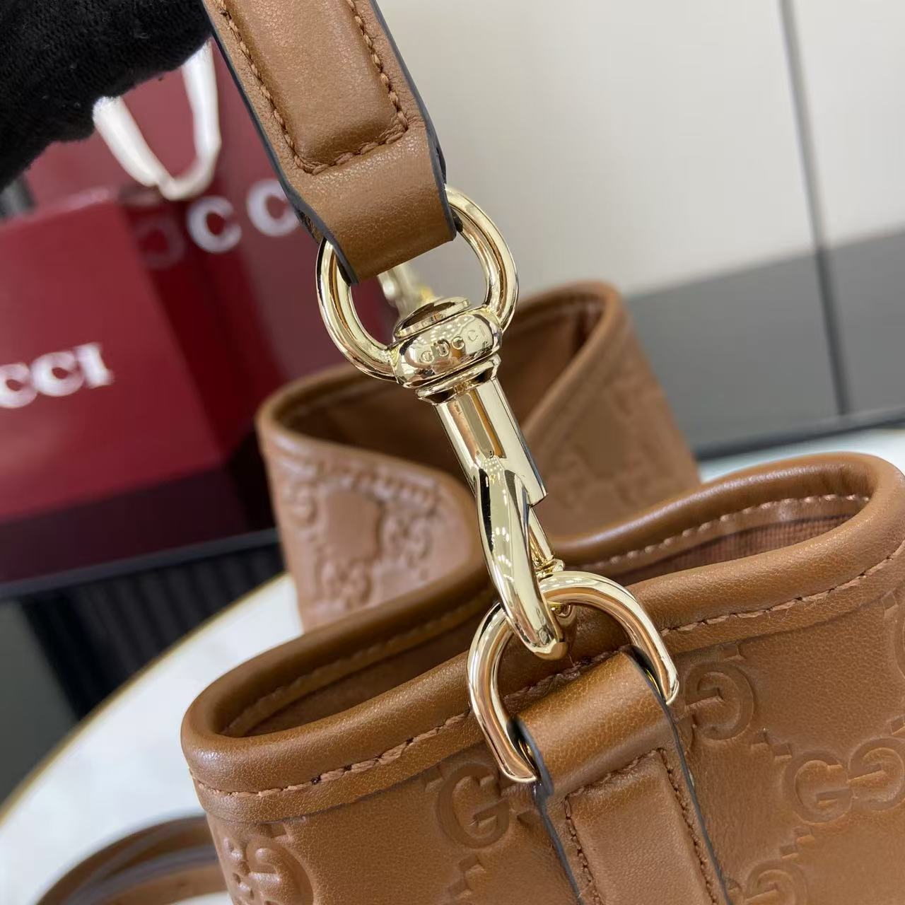 Gucci GG Emblem Small Bucket Bag  - FashionPlug