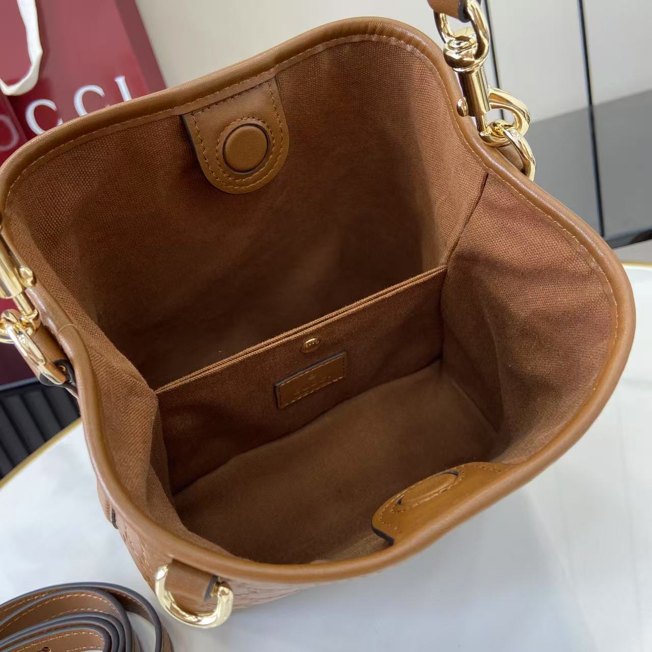 Gucci GG Emblem Small Bucket Bag  - FashionPlug