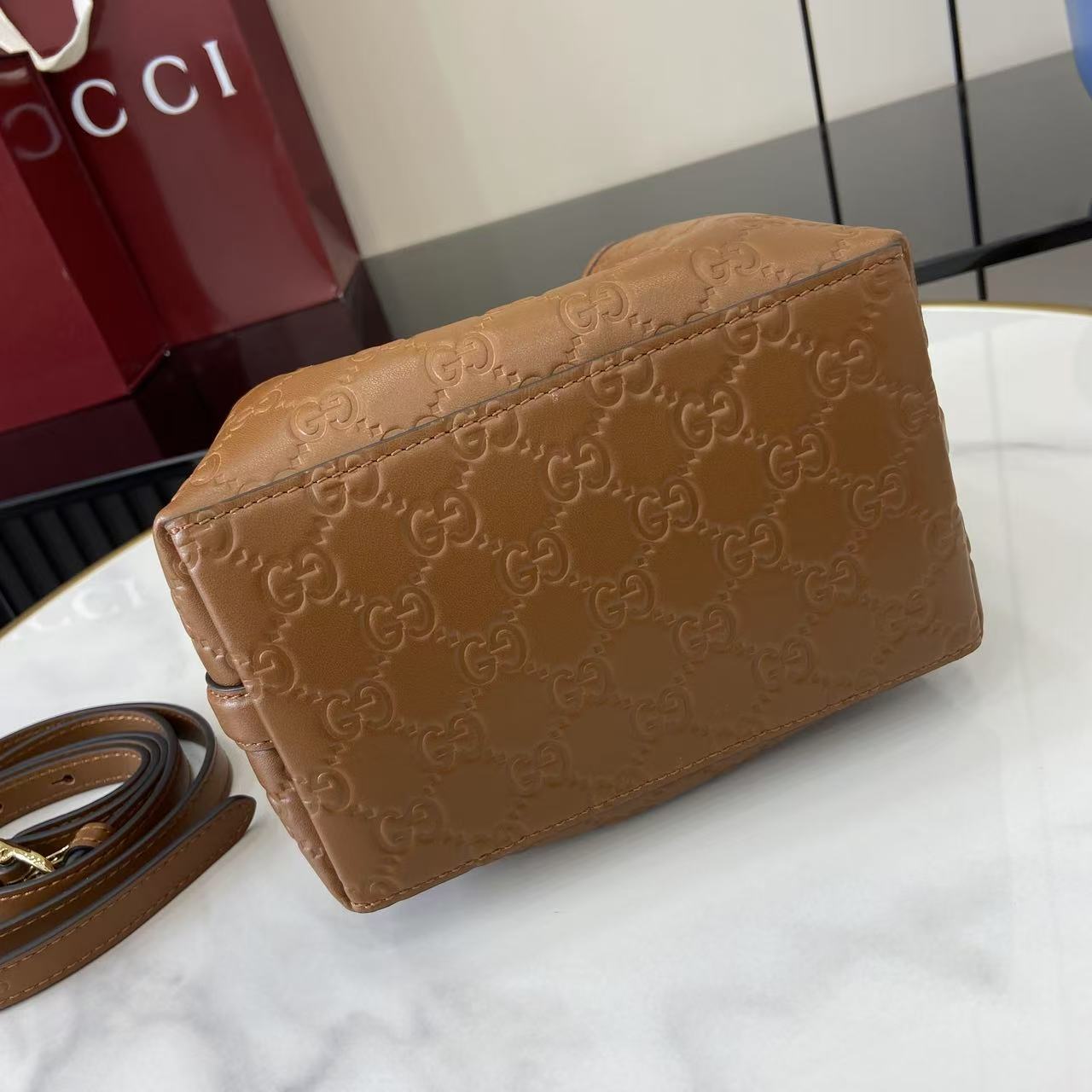 Gucci GG Emblem Small Bucket Bag  - FashionPlug