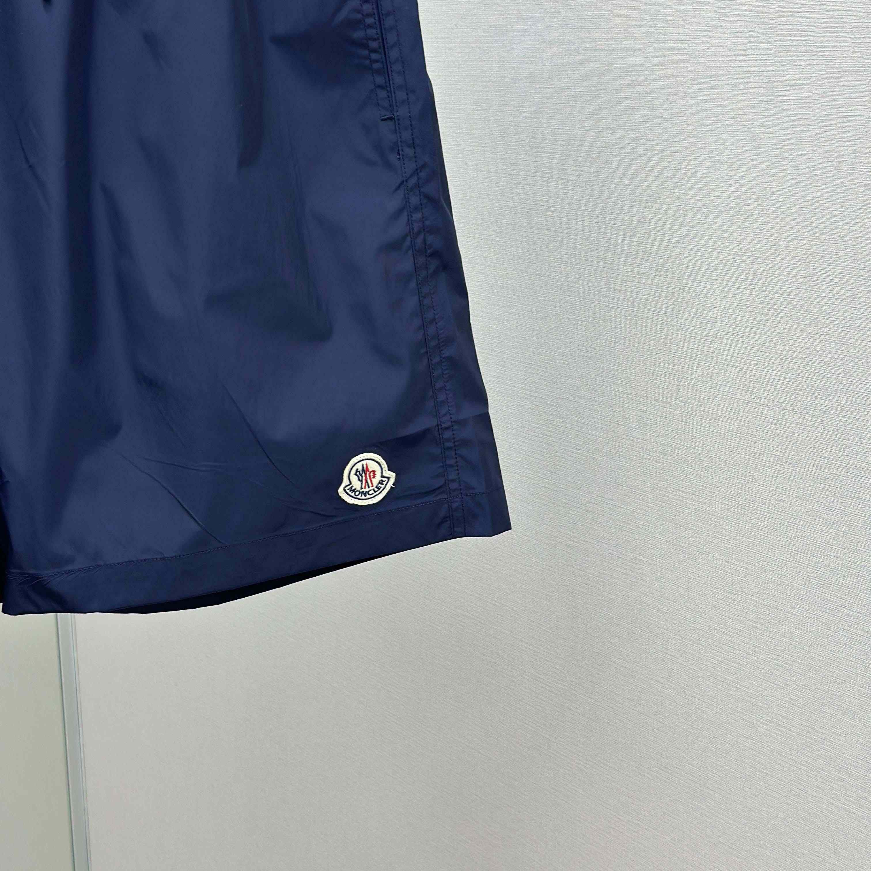 Moncler Logo Patch Swim Shorts - FashionPlug