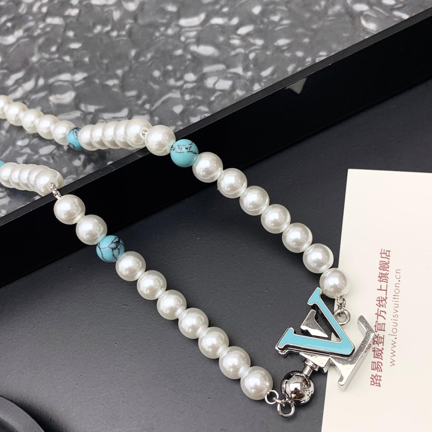 Louis Vuitton Turquoise Rodeo Necklace   M02058 - FashionPlug