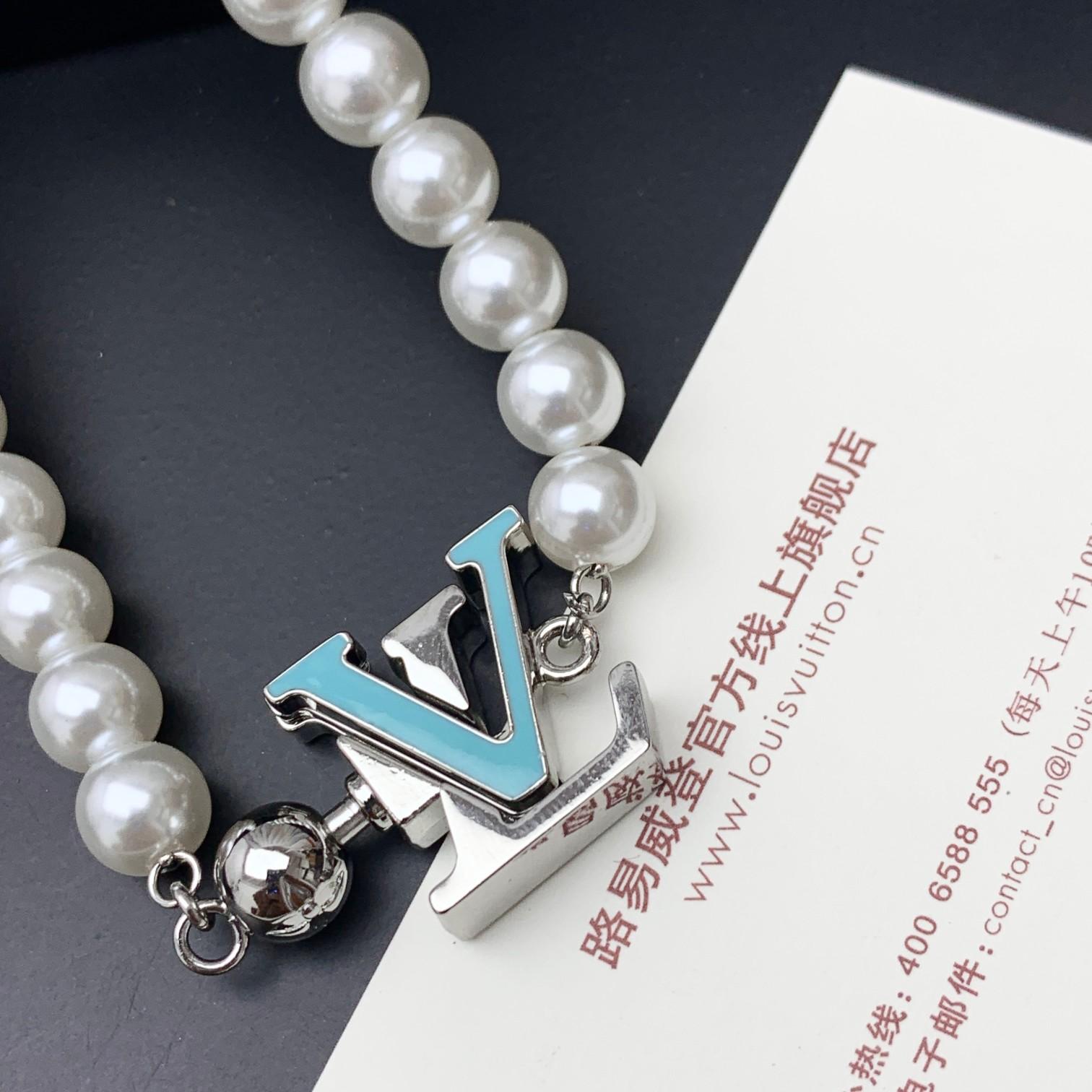 Louis Vuitton Turquoise Rodeo Necklace   M02058 - FashionPlug