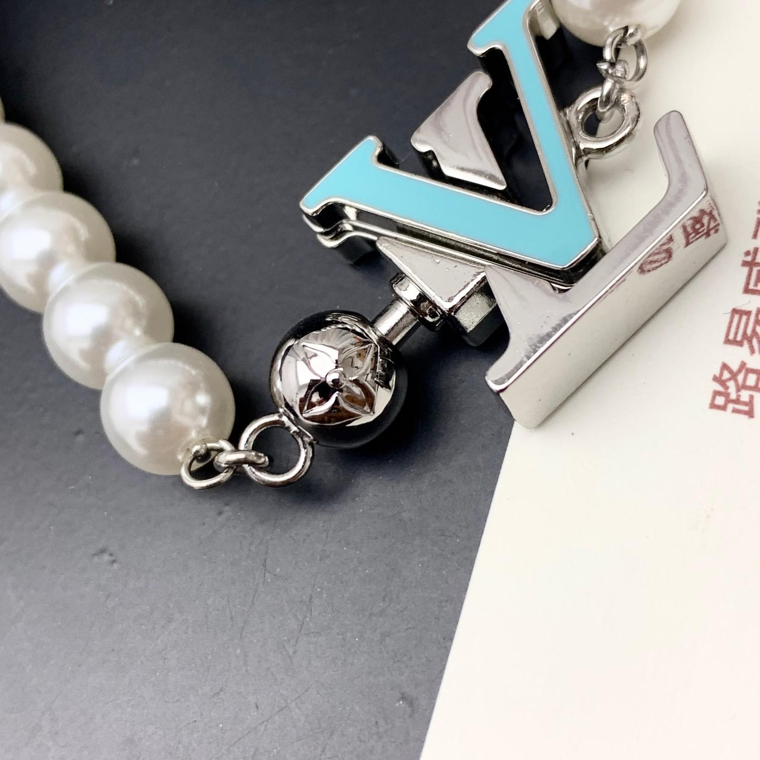 Louis Vuitton Turquoise Rodeo Necklace   M02058 - FashionPlug