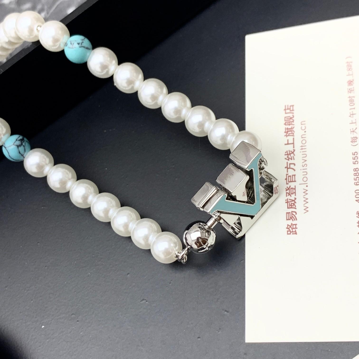Louis Vuitton Turquoise Rodeo Necklace   M02058 - FashionPlug
