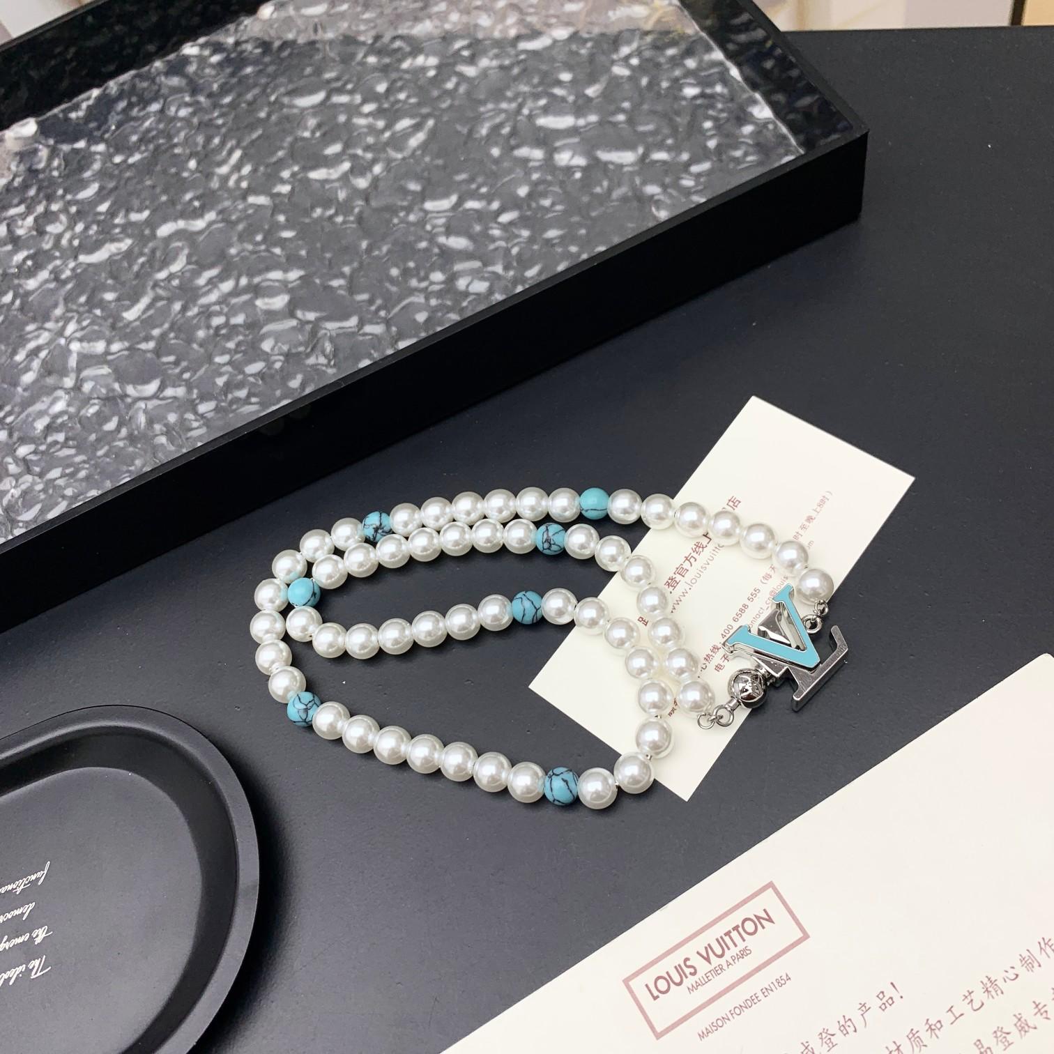 Louis Vuitton Turquoise Rodeo Necklace   M02058 - FashionPlug