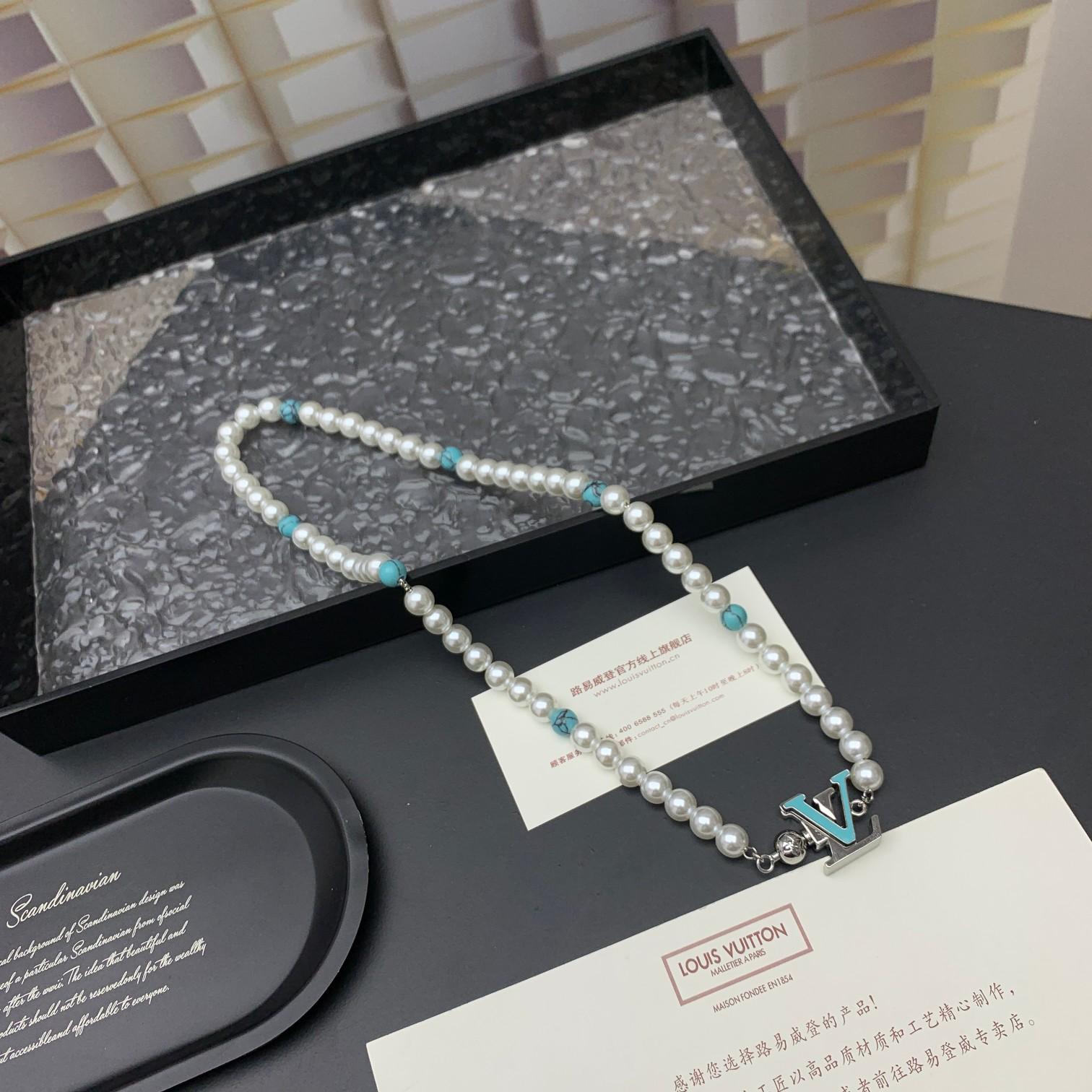 Louis Vuitton Turquoise Rodeo Necklace   M02058 - FashionPlug
