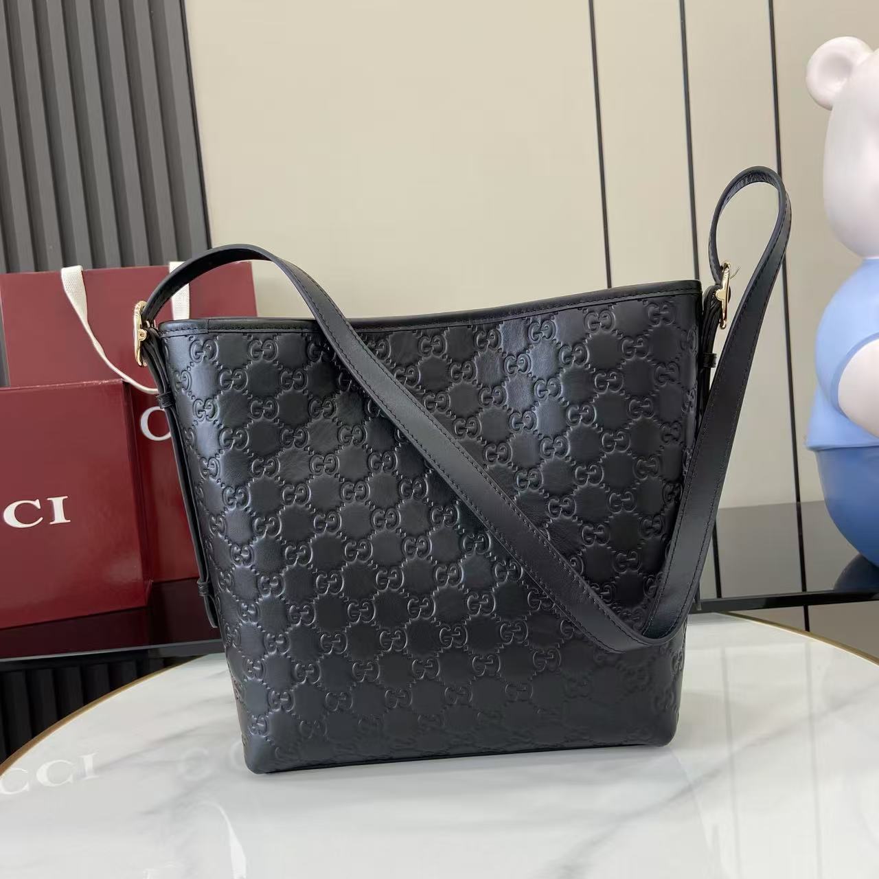 Gucci GG Emblem Small Shoulder Bag - FashionPlug