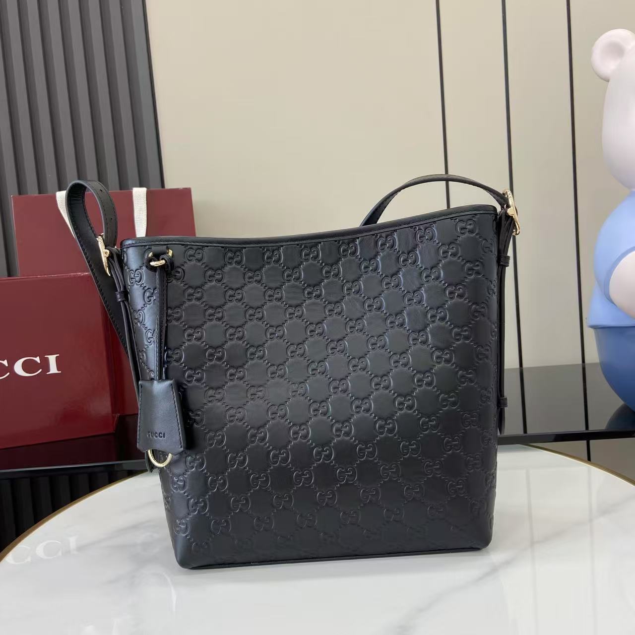 Gucci GG Emblem Small Shoulder Bag - FashionPlug