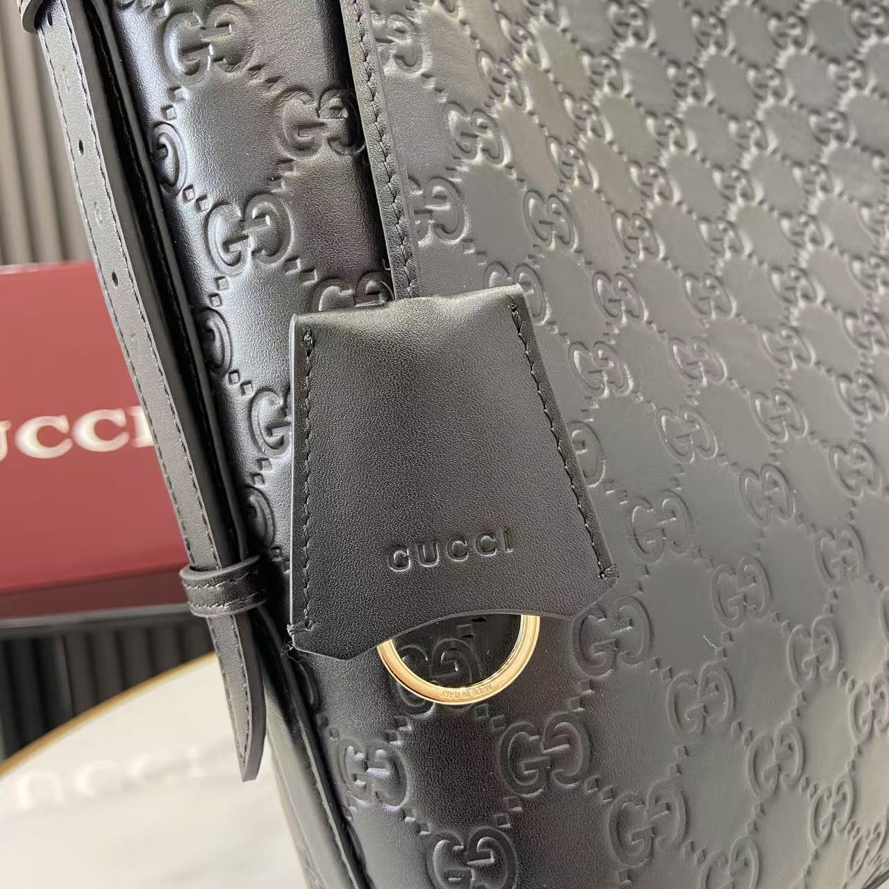 Gucci GG Emblem Small Shoulder Bag - FashionPlug