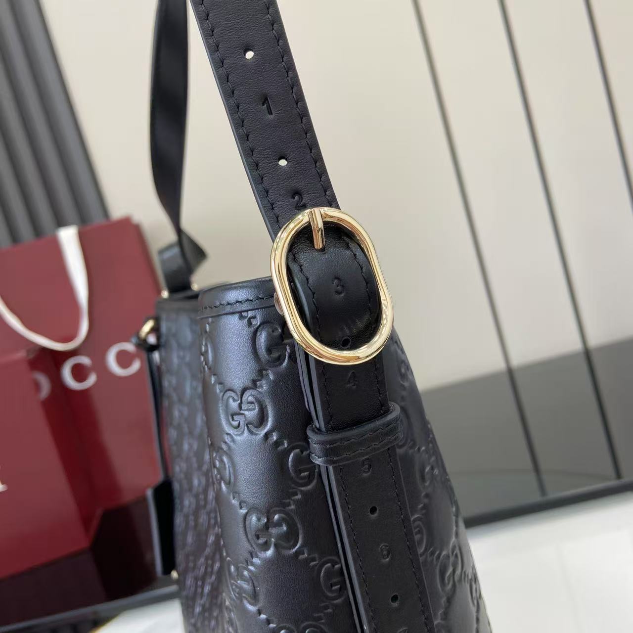 Gucci GG Emblem Small Shoulder Bag - FashionPlug