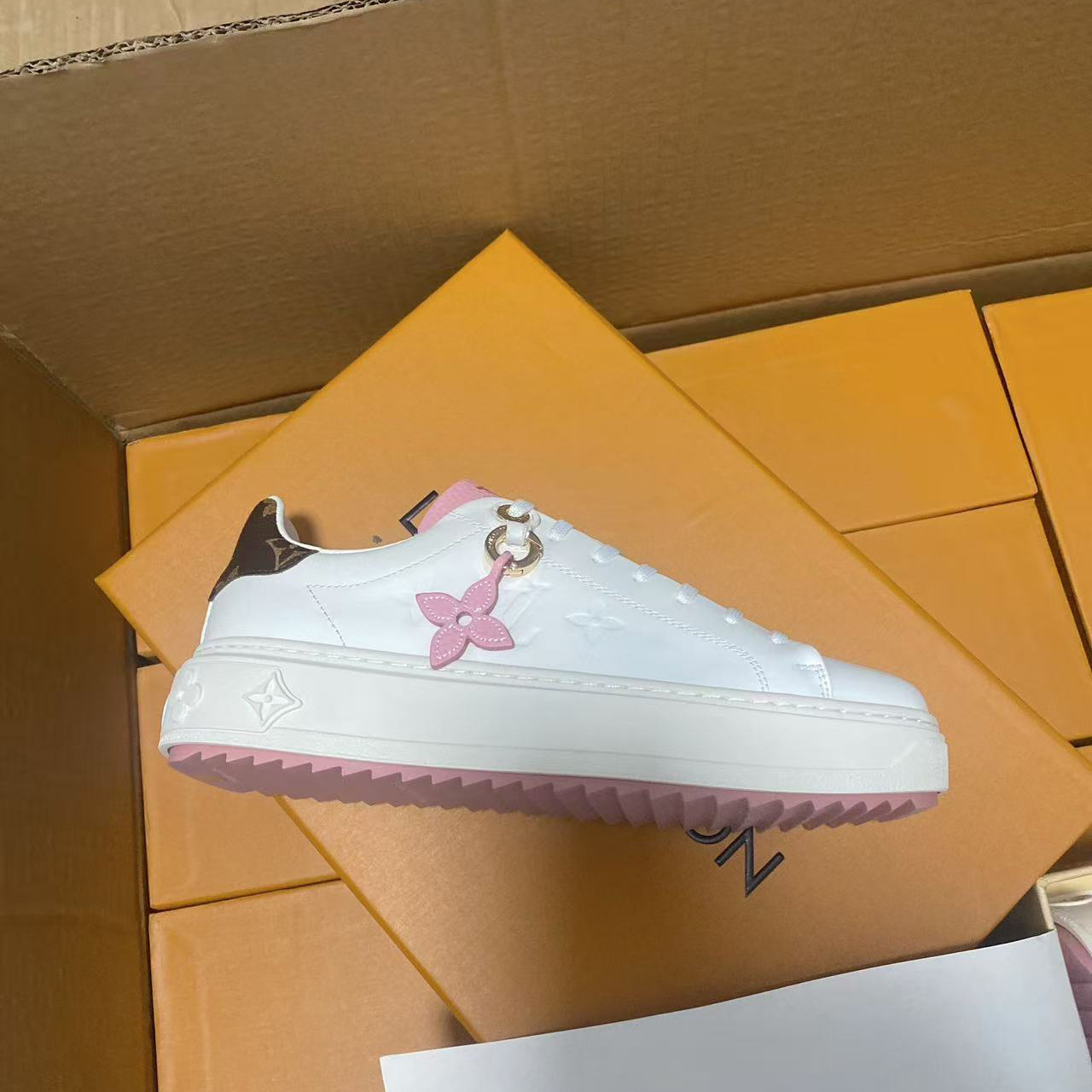 Louis Vuitton Time Out Sneaker - FashionPlug