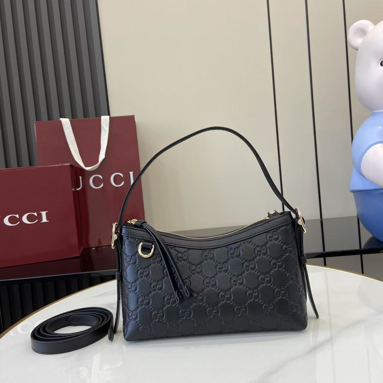 Gucci GG Emblem Small Shoulder Bag - FashionPlug