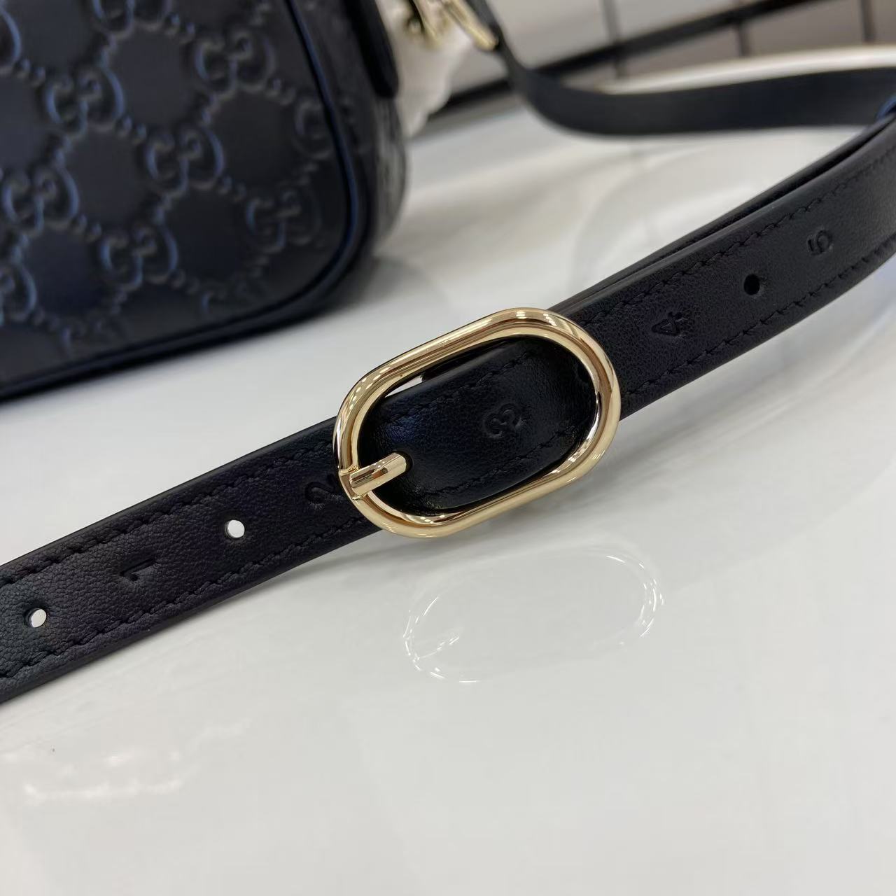 Gucci GG Emblem Small Shoulder Bag - FashionPlug
