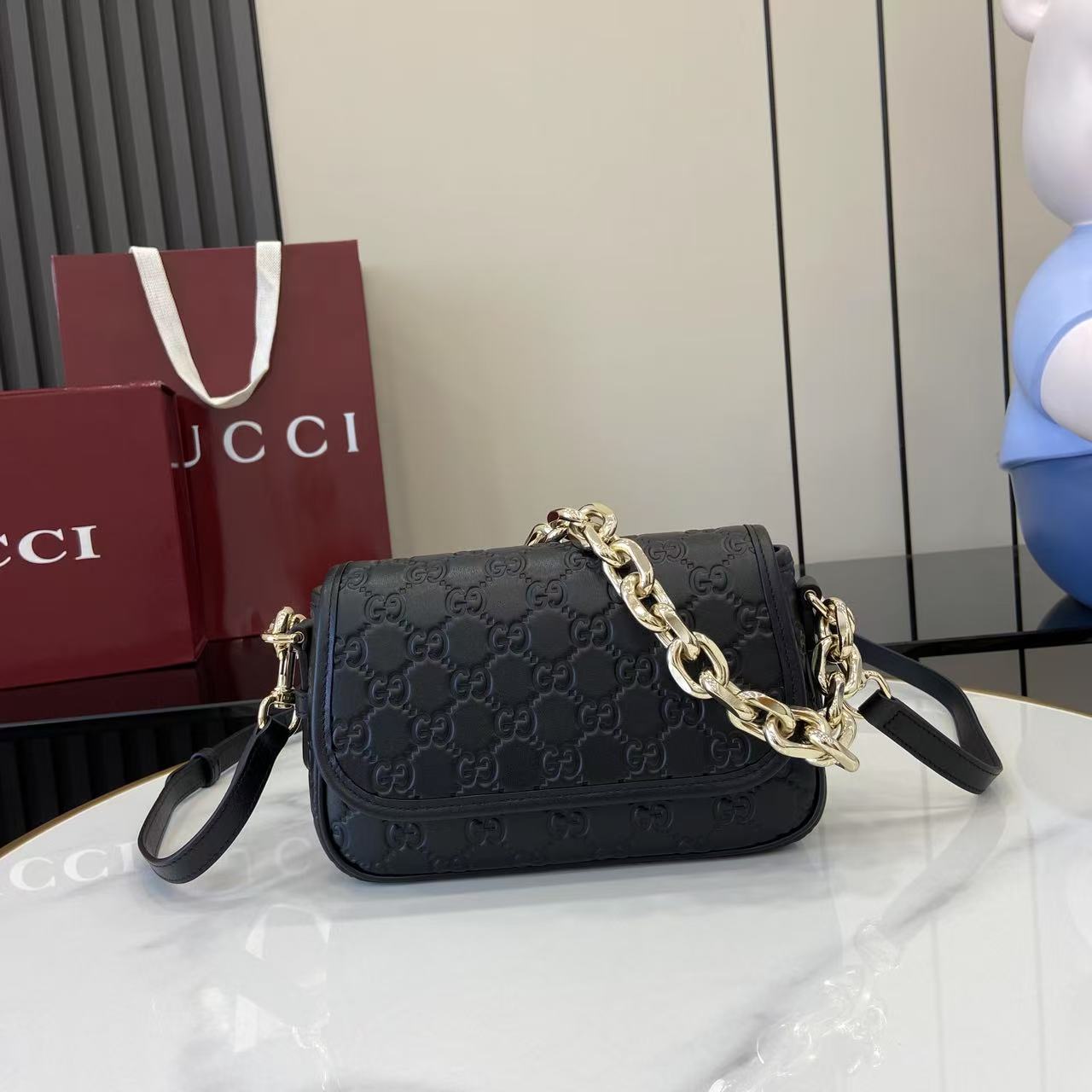 Gucci GG Emblem Small Shoulder Bag - FashionPlug