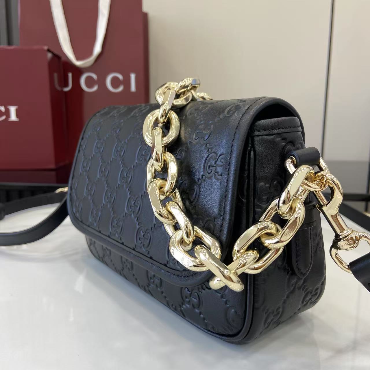 Gucci GG Emblem Small Shoulder Bag - FashionPlug