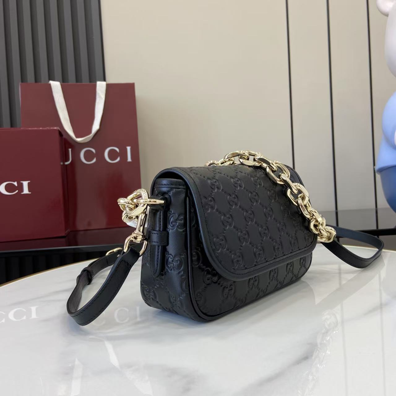 Gucci GG Emblem Small Shoulder Bag - FashionPlug