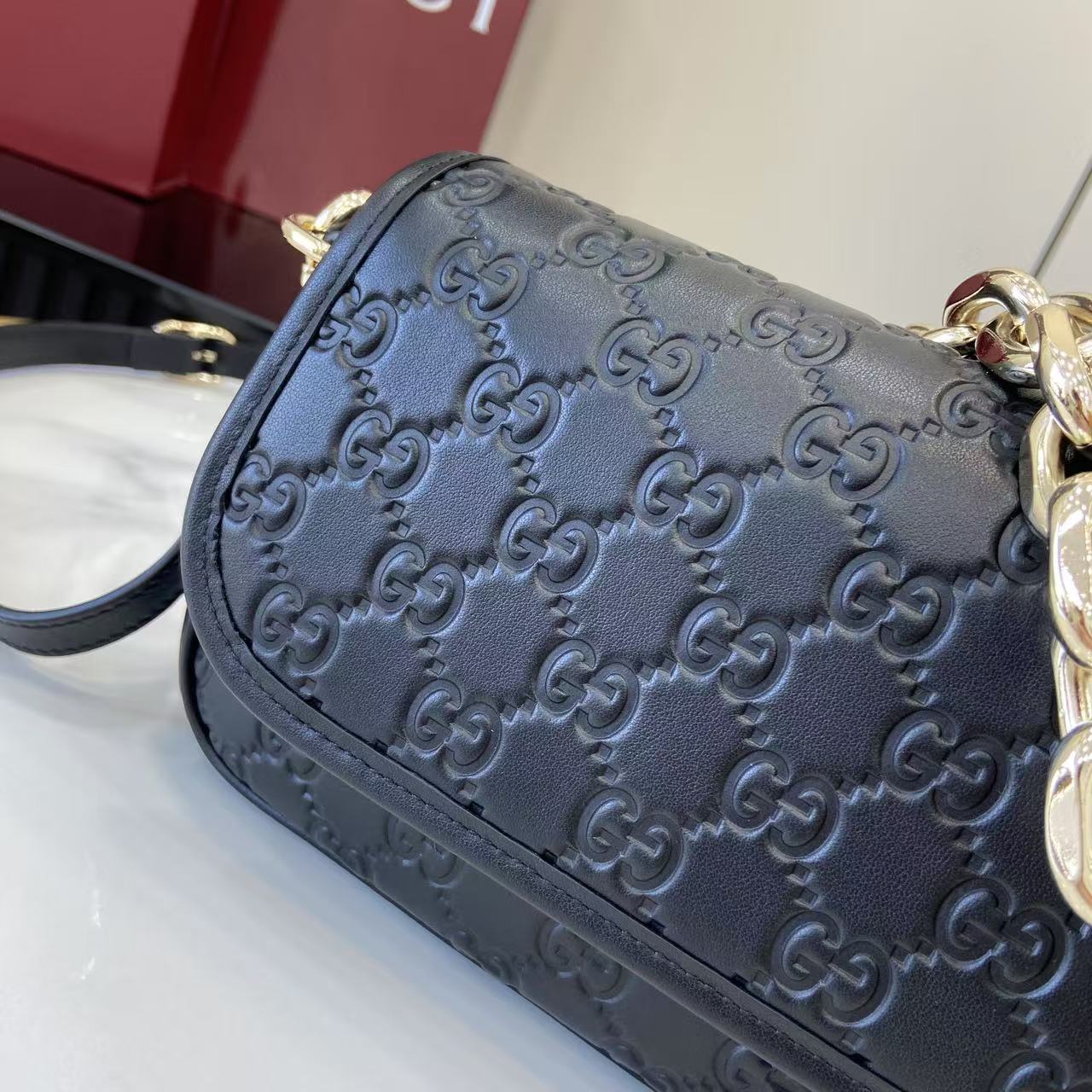 Gucci GG Emblem Small Shoulder Bag - FashionPlug