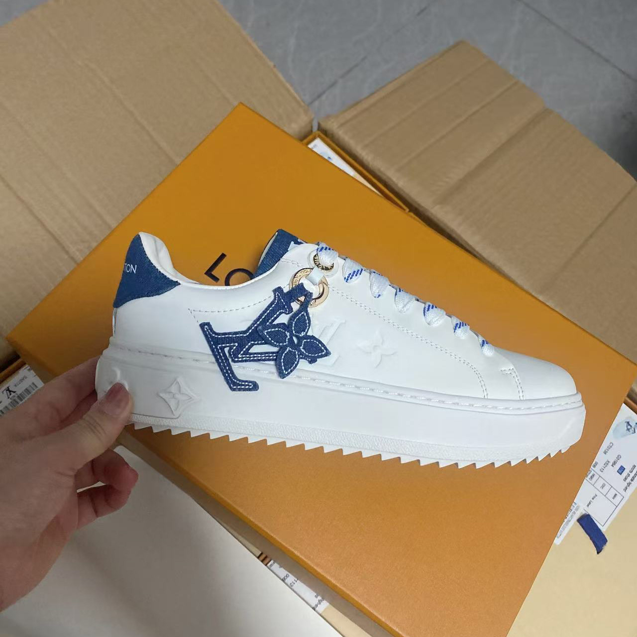 Louis Vuitton Time Out Sneaker    - FashionPlug