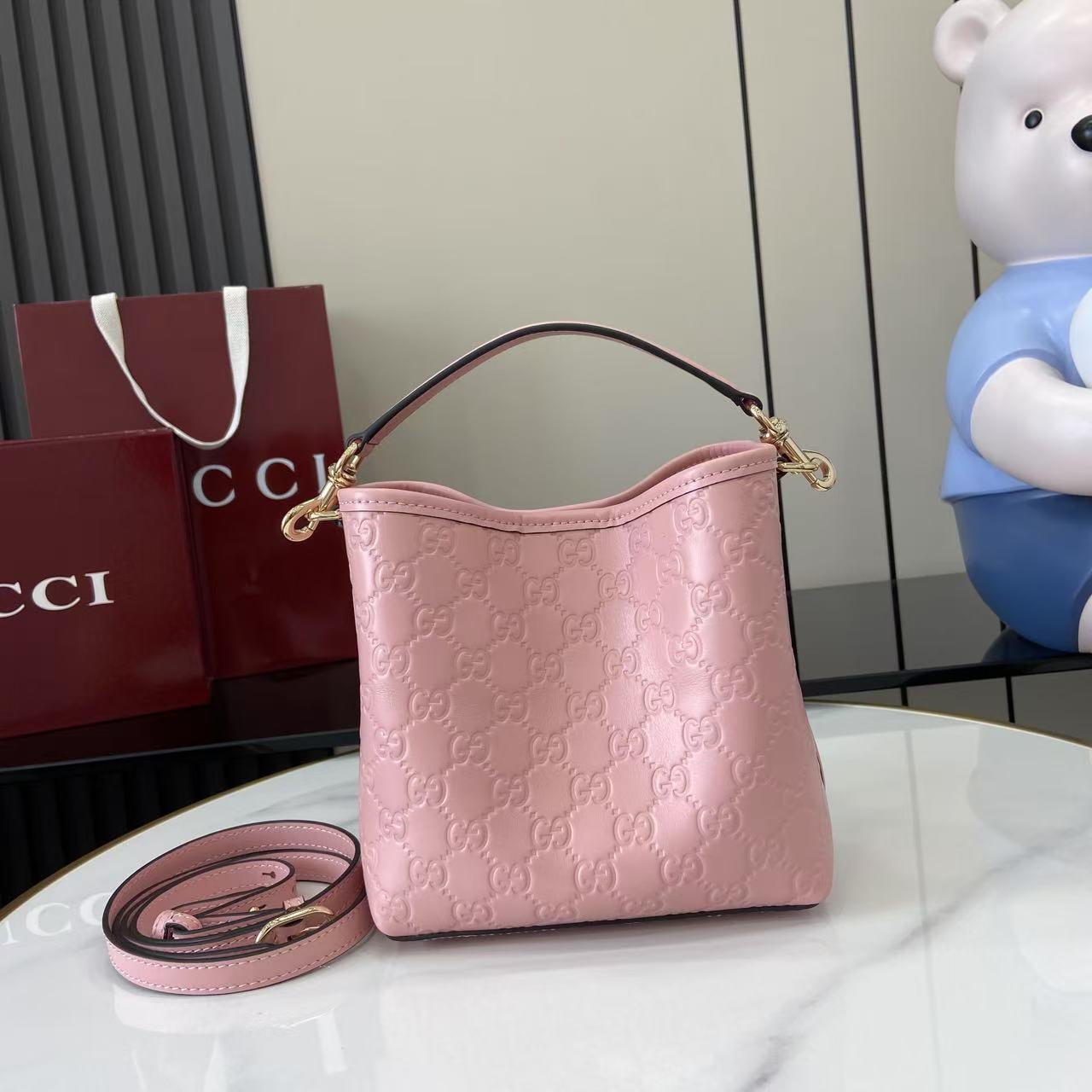 Gucci GG Emblem Nano Bucket Bag - FashionPlug