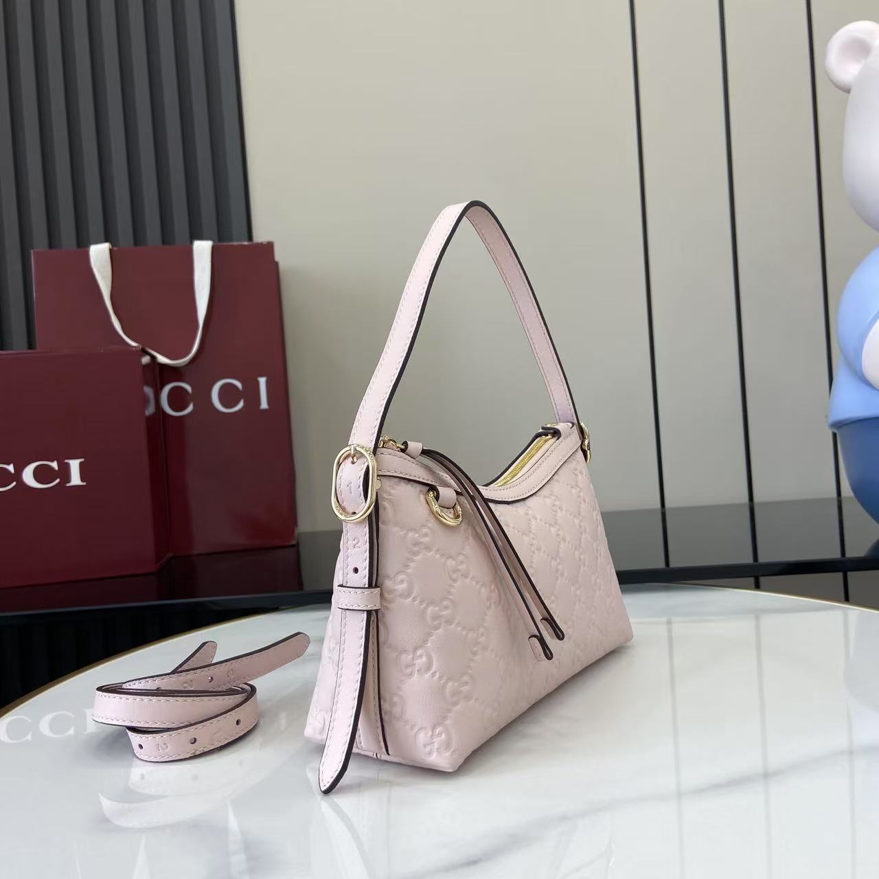Gucci GG Emblem Small Shoulder Bag - FashionPlug