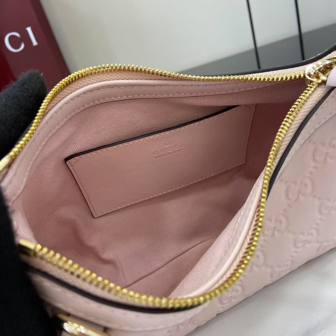 Gucci GG Emblem Small Shoulder Bag - FashionPlug