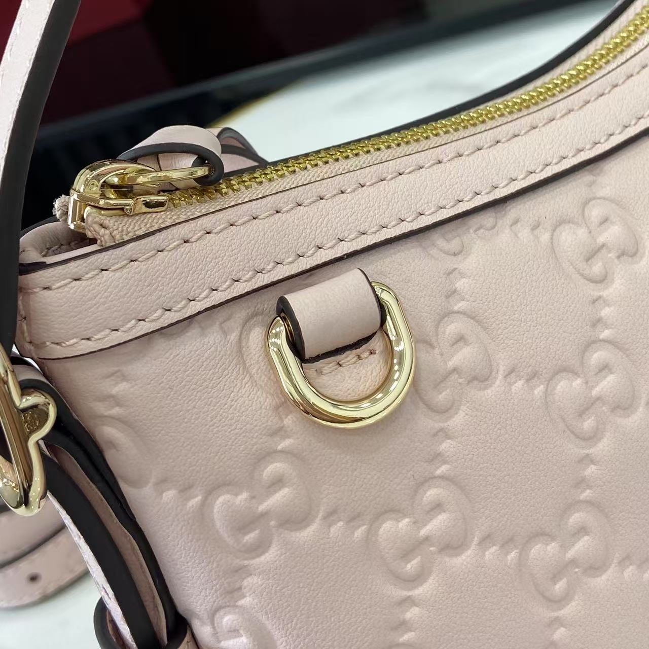 Gucci GG Emblem Small Shoulder Bag - FashionPlug