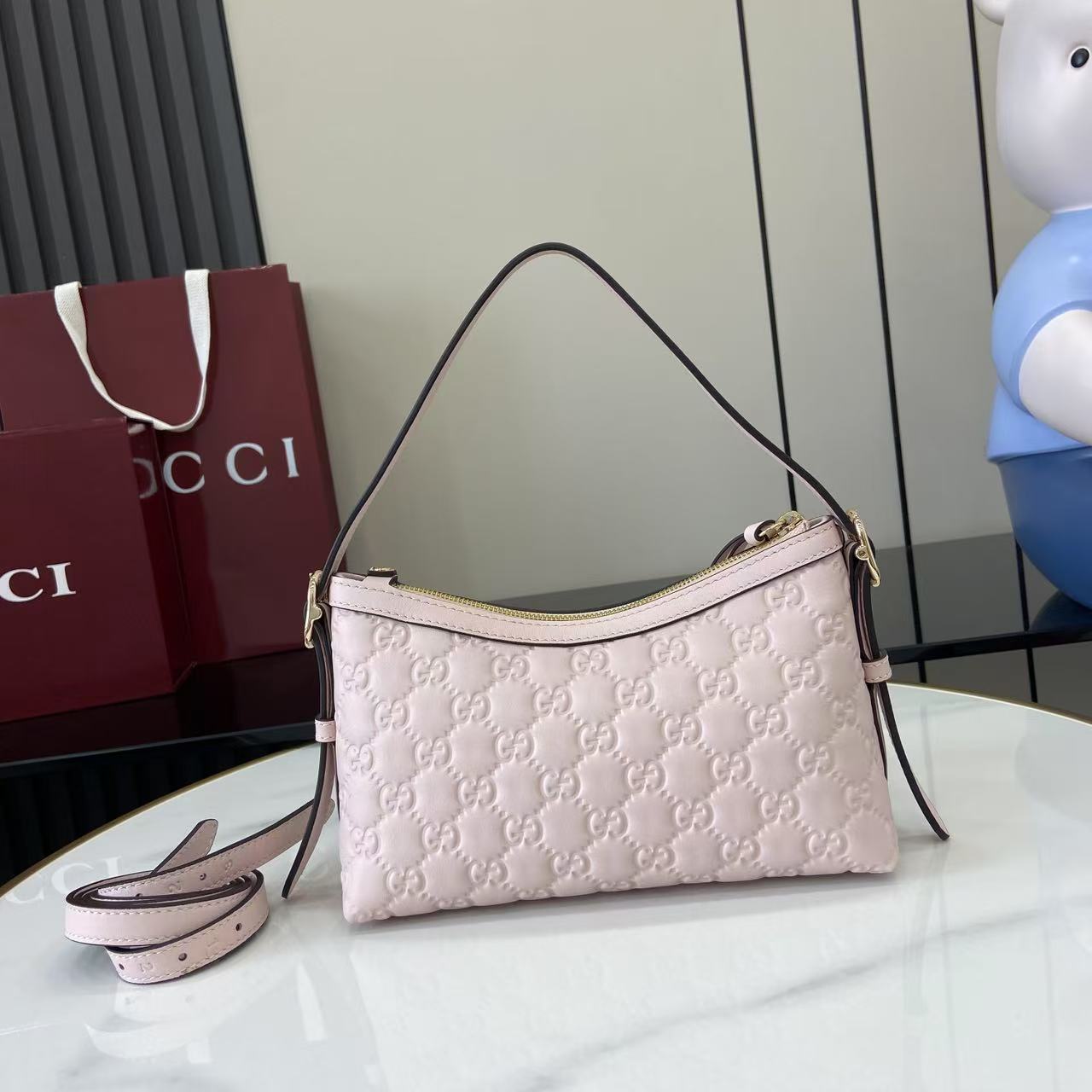 Gucci GG Emblem Small Shoulder Bag - FashionPlug