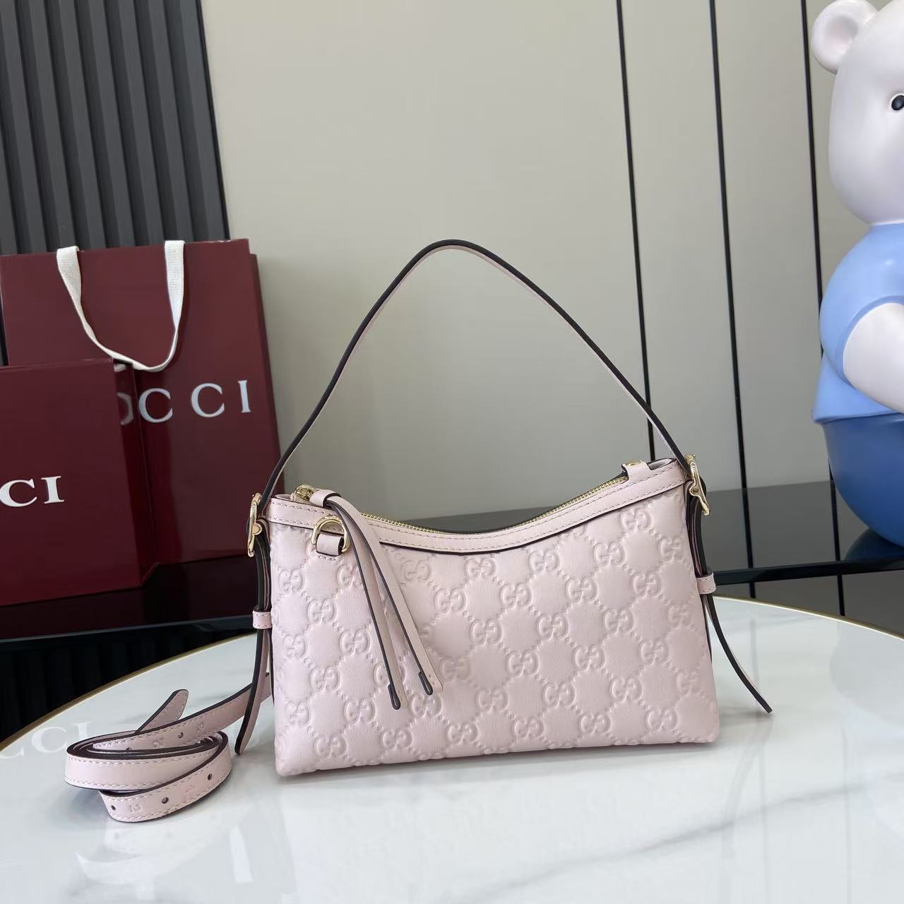 Gucci GG Emblem Small Shoulder Bag - FashionPlug
